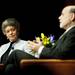 Joan and Sanford Weill Dean of Public Policy Susan Collins listens to Federal Reserve Chairman Ben Bernanke as he answers questions at Rackham Auditorium on Monday, Jan. 14. Daniel Brenner I AnnArbor.com